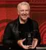 Alex Lifeson with the National Guitar Museum's Lifetime Achievement Award for 2024